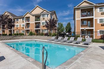 our apartments have a resort style pool with lounge chairs